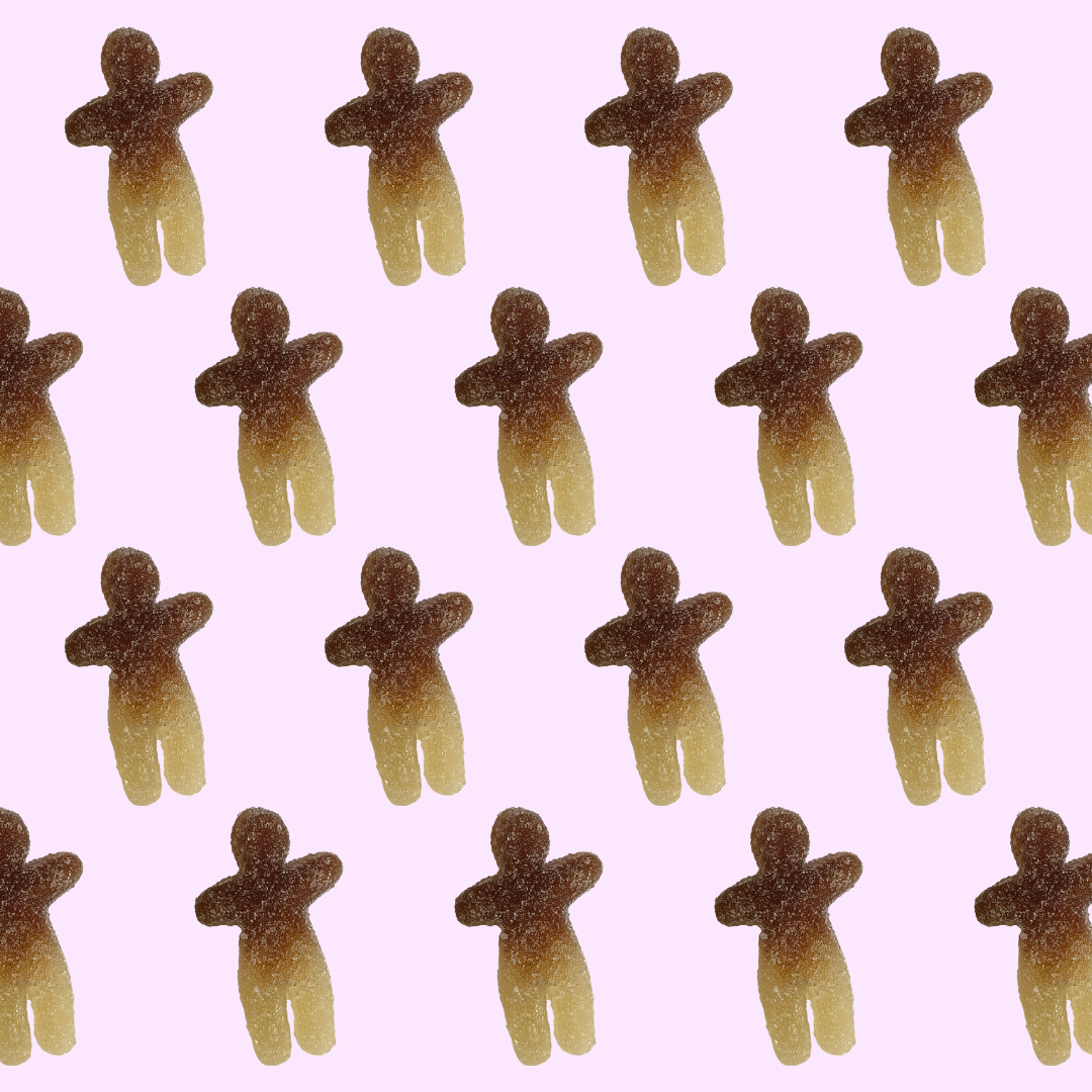 Pattern of cola flavored men gummies on a pink background