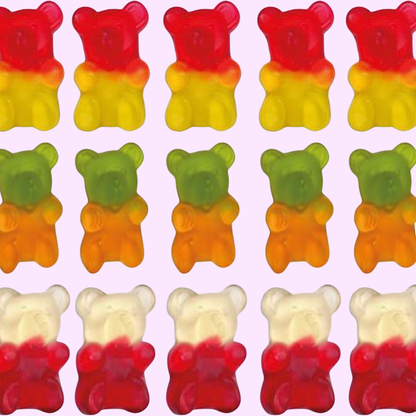 giant bear gummies in multiple colors over a light pink background