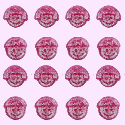Pink and white jelly faces with smiles players on a pink background