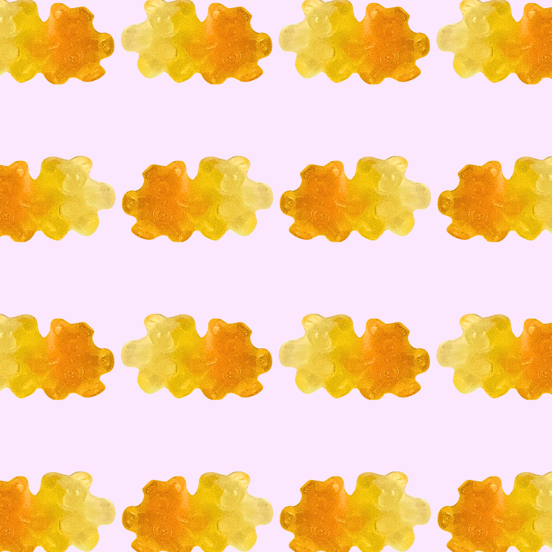 Pattern of orange and yellow gummy bears on a light purple background