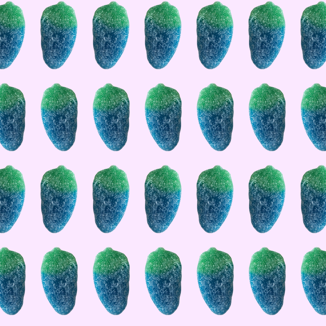 Pattern of blue and green textured objects on a light purple background
