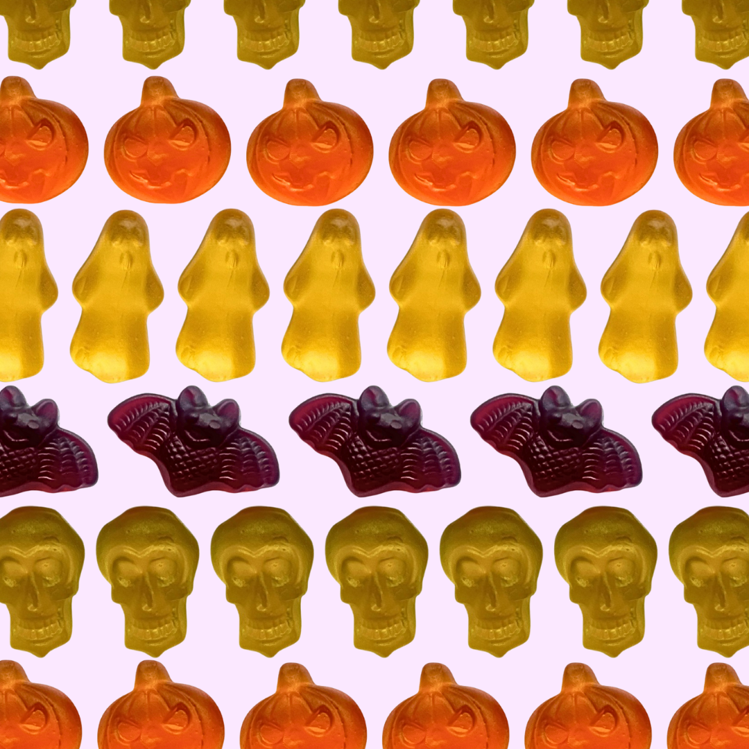 candies in the shapes of pumpkins, bats, ghosts, and skulls for halloween