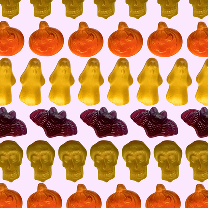 candies in the shapes of pumpkins, bats, ghosts, and skulls for halloween
